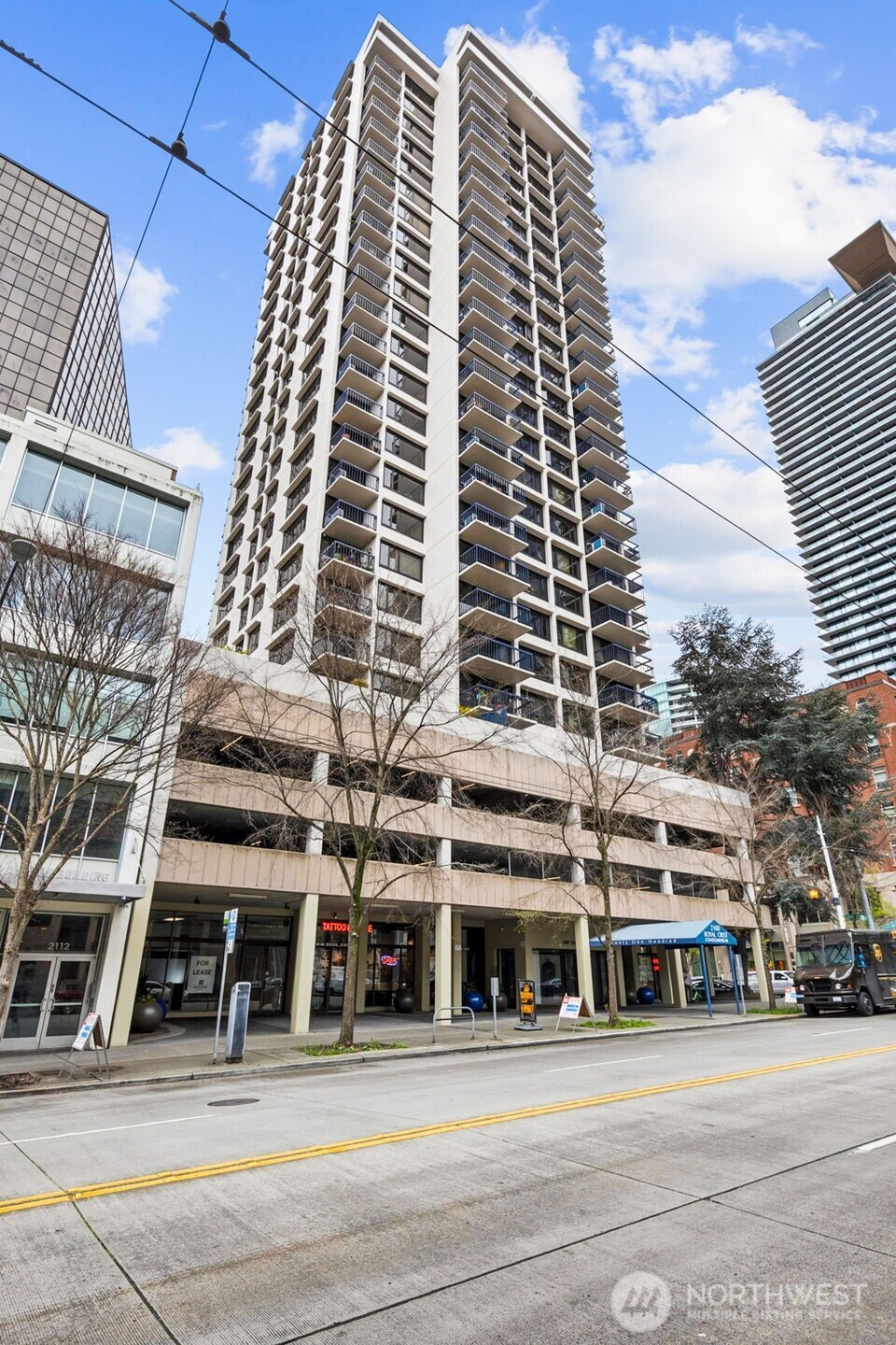 2100 3rd Avenue, Unit 802 Seattle, WA 98121 - Photo 3 of 35 a front view of a building with a street
