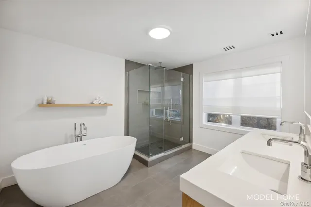 a bathroom with a sink and a bathtub