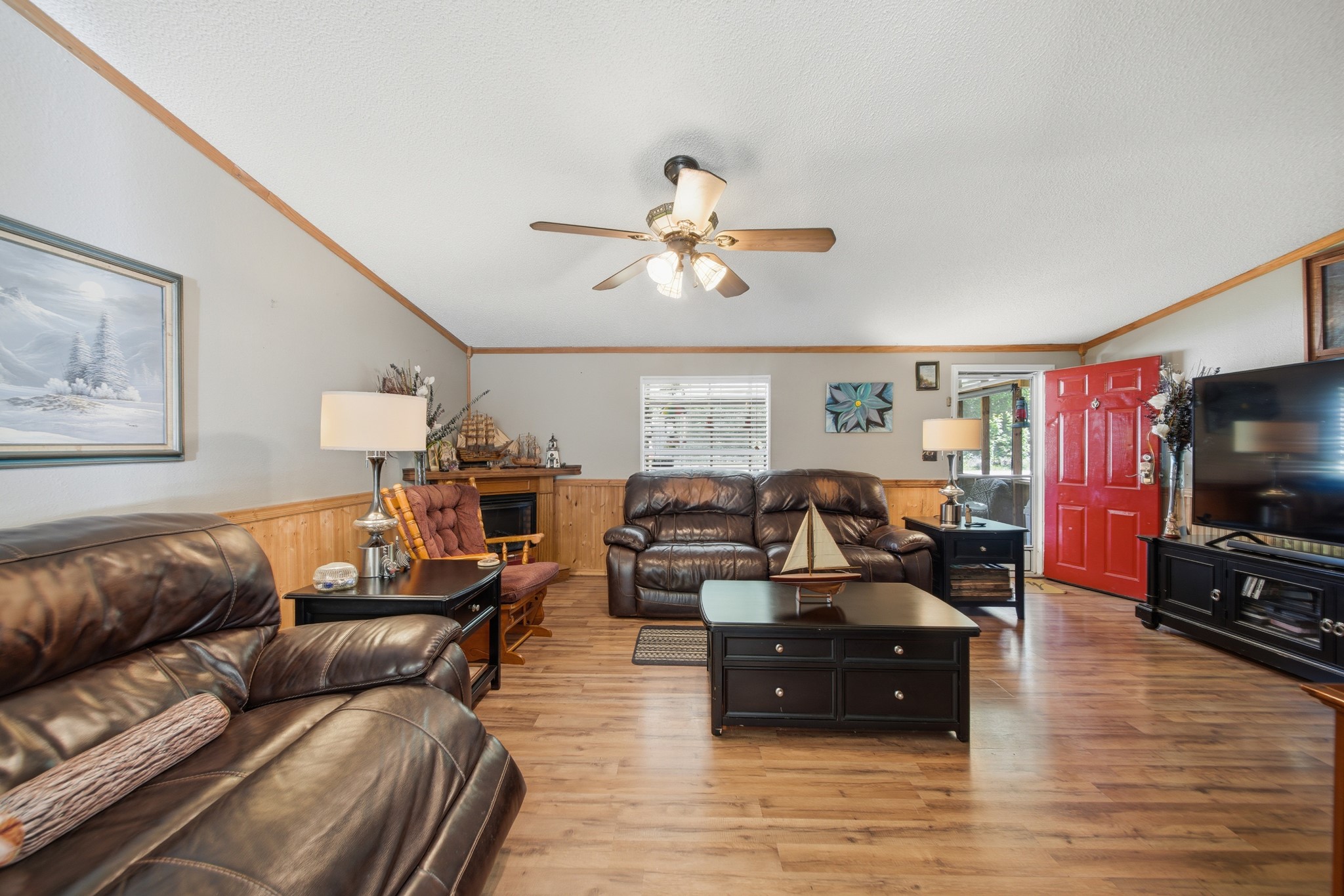 199 Apple Tree Livingston, TX 77351 - Photo 19 of 41 a living room with furniture and a flat screen tv
