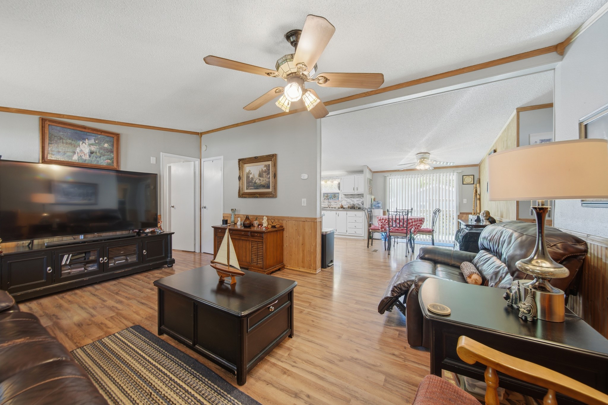 199 Apple Tree Livingston, TX 77351 - Photo 20 of 41 a living room with furniture and a flat screen tv