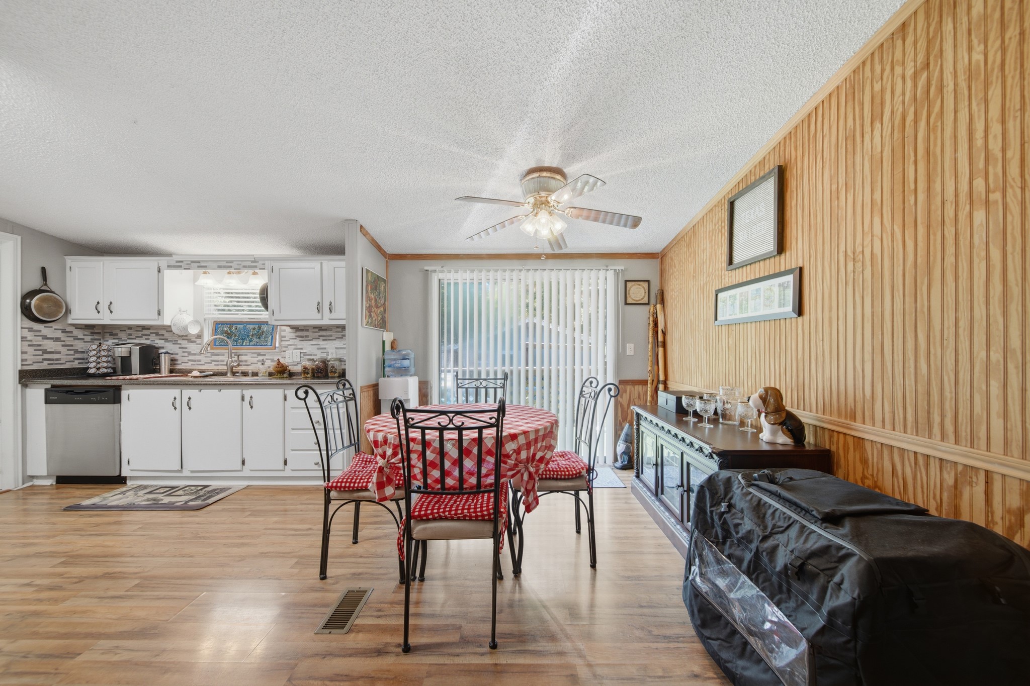 199 Apple Tree Livingston, TX 77351 - Photo 21 of 41 a view of a dining room with furniture window and wooden floor