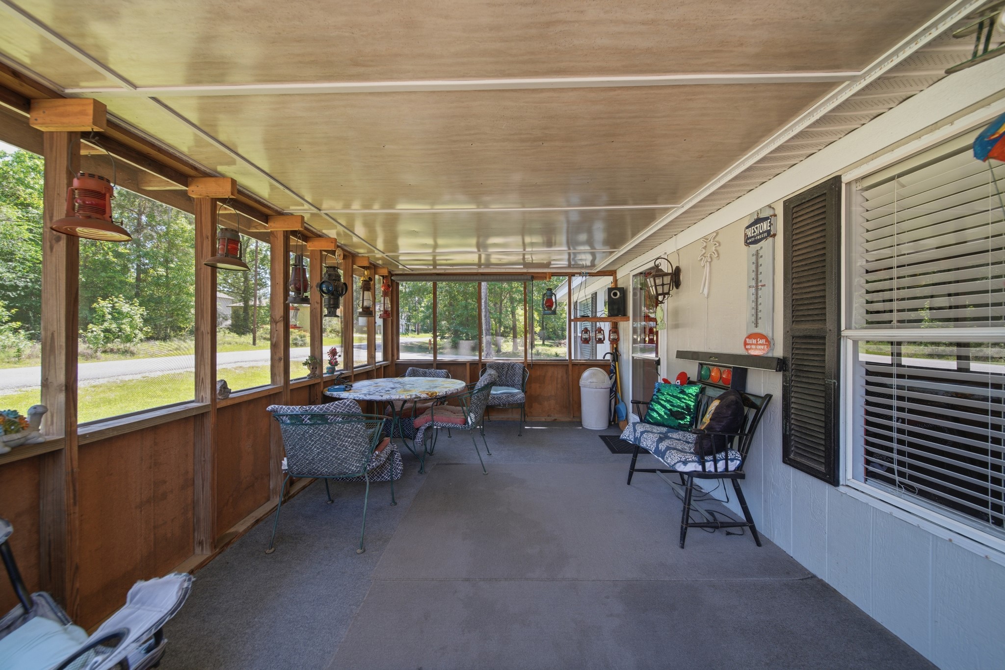 199 Apple Tree Livingston, TX 77351 - Photo 37 of 41 Front Porch, fully screened so it is a great place to enjoy the sunrises/sunsets.