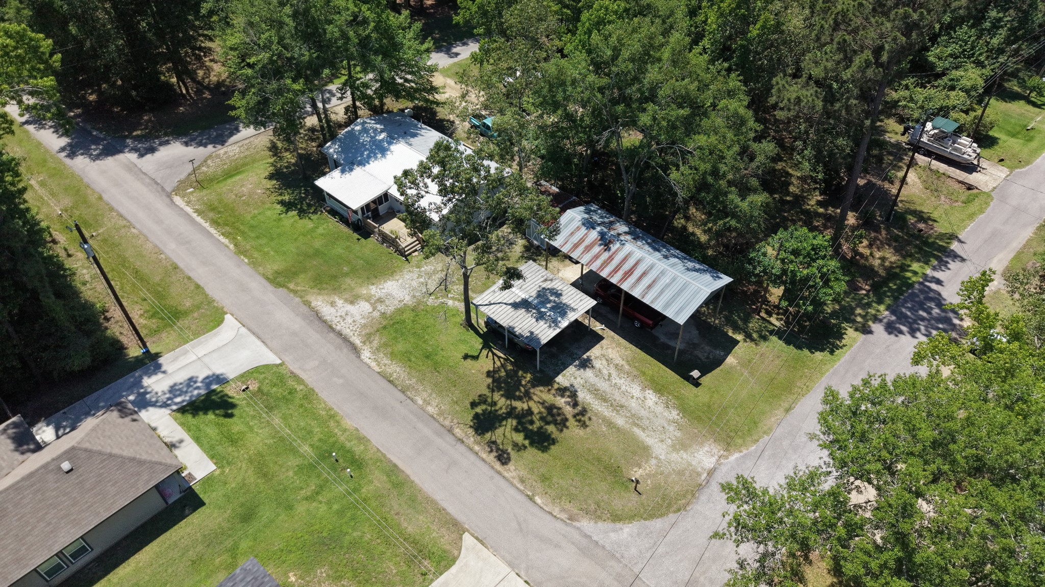 199 Apple Tree Livingston, TX 77351 - Photo 40 of 41 an aerial view of a house a yard and a fireplace
