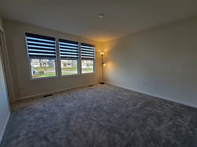 a view of empty room with windows