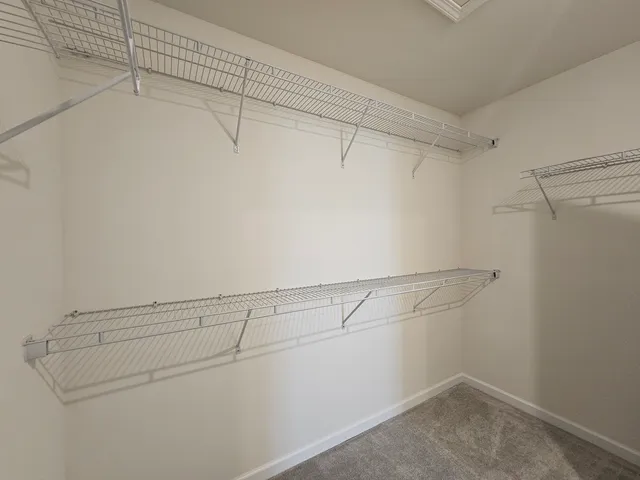 a view of a room with racks on the wall