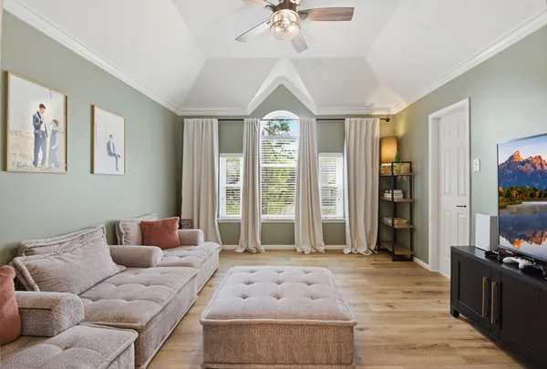 a living room with furniture and a window