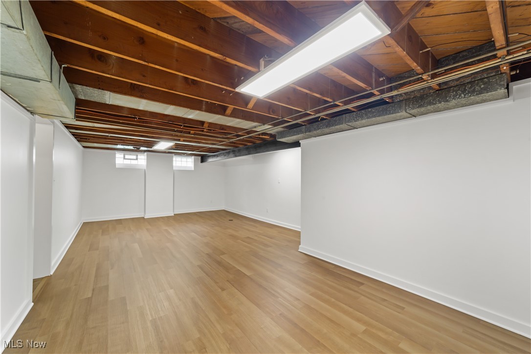 4648 Ammon Road Cleveland, OH 44143 - Photo 35 of 48 Basement featuring light wood-style floors