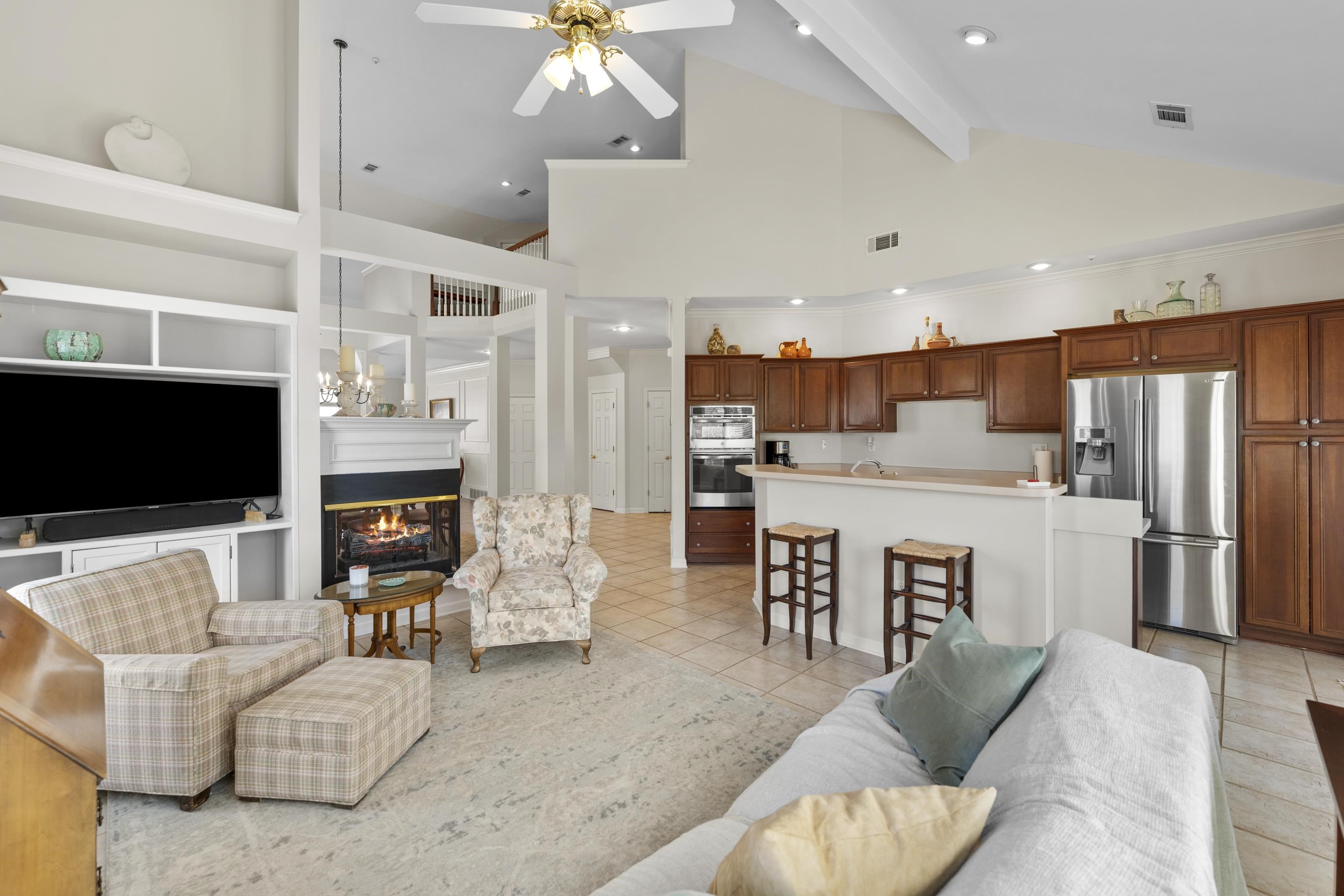 1701 Village Ridge Place Collierville, TN 38017 - Photo 14 of 38 a living room with furniture and a flat screen tv