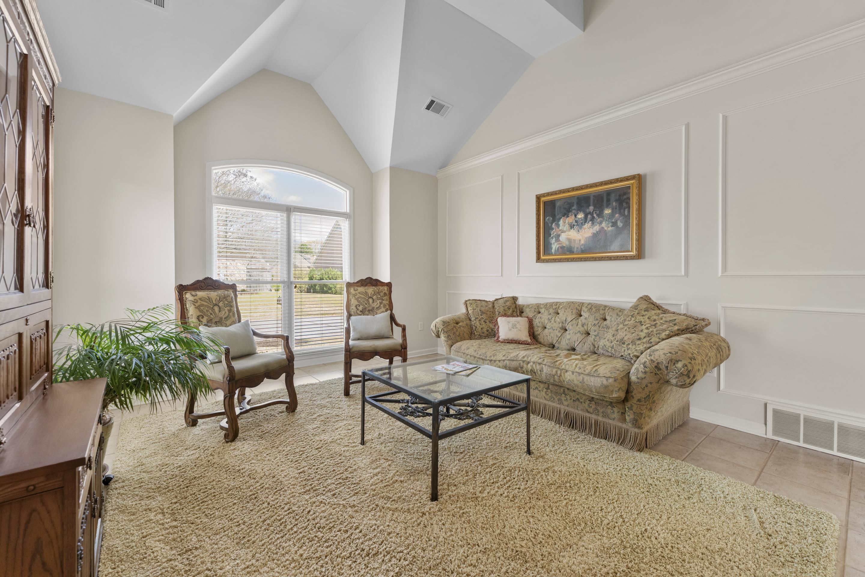 1701 Village Ridge Place Collierville, TN 38017 - Photo 6 of 38 a living room with furniture and a large window