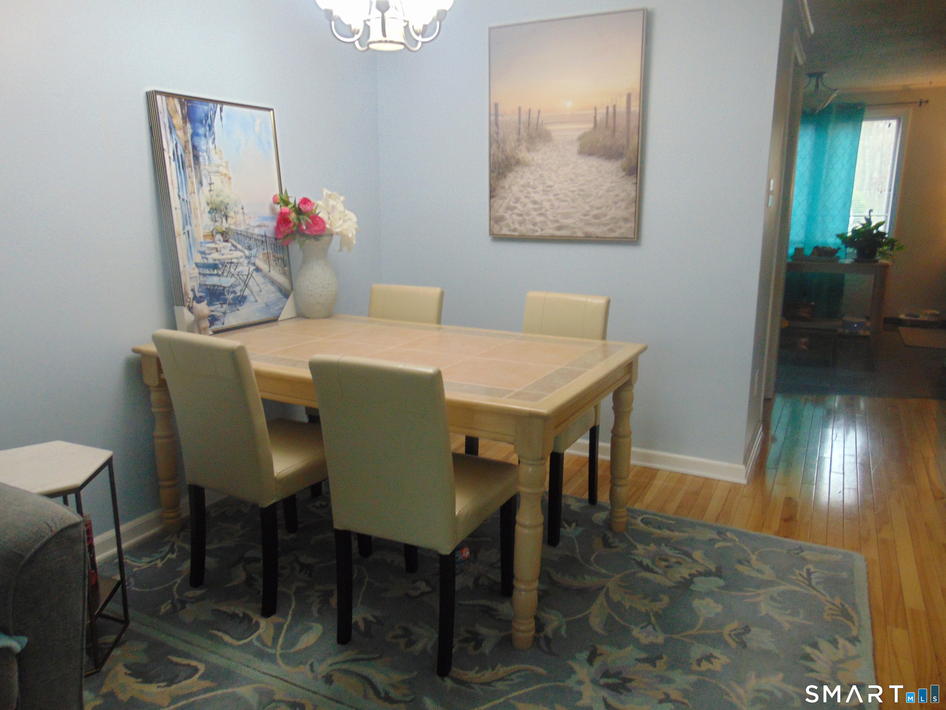 882 North Colony Road, Unit 31 Meriden, CT 06450 - Photo 11 of 34 a view of a dining room with furniture and wooden floor