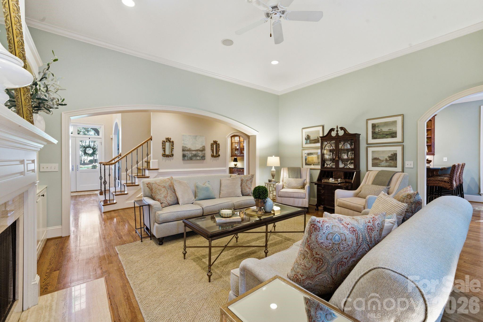 185 Quaker Road Mooresville, NC 28117 - Photo 12 of 43 a living room with furniture and a fireplace