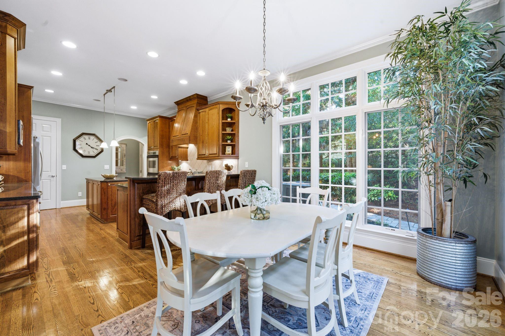 185 Quaker Road Mooresville, NC 28117 - Photo 19 of 43 a view of a dining room with furniture window and outside view