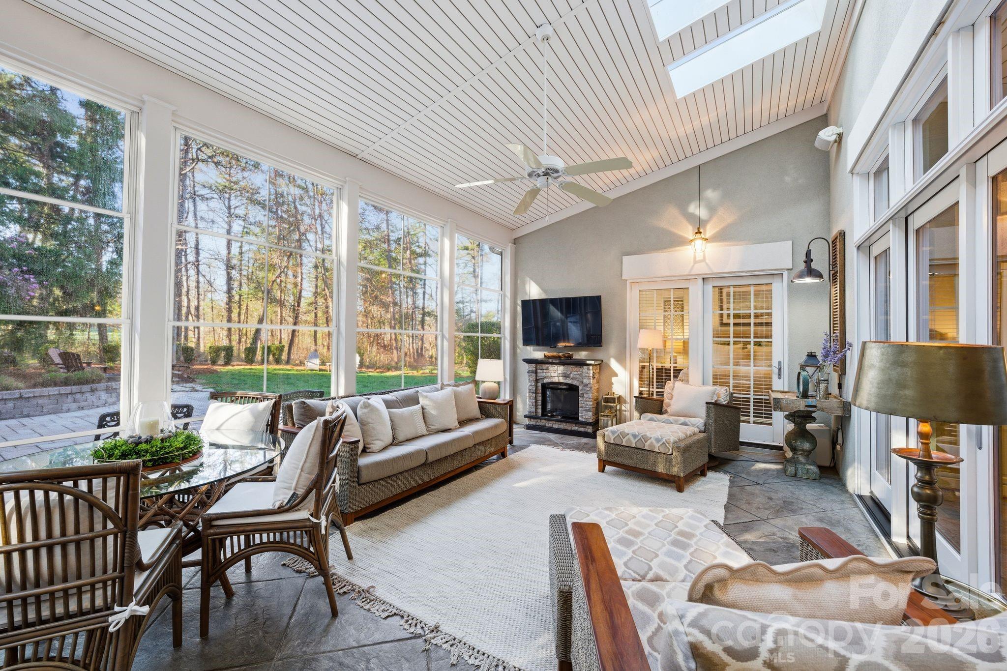 185 Quaker Road Mooresville, NC 28117 - Photo 21 of 43 a living room with furniture fireplace and a large window