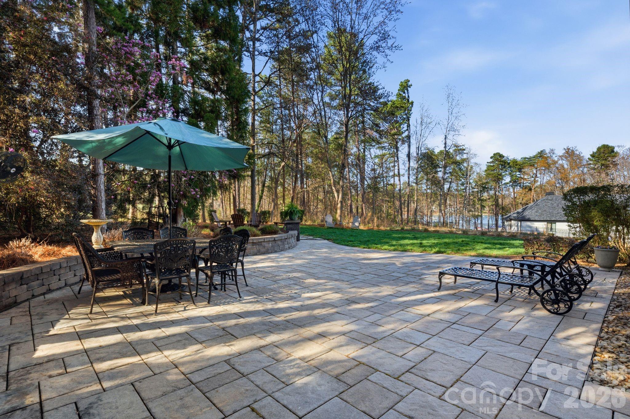185 Quaker Road Mooresville, NC 28117 - Photo 37 of 43 a view of outdoor dining space with a patio