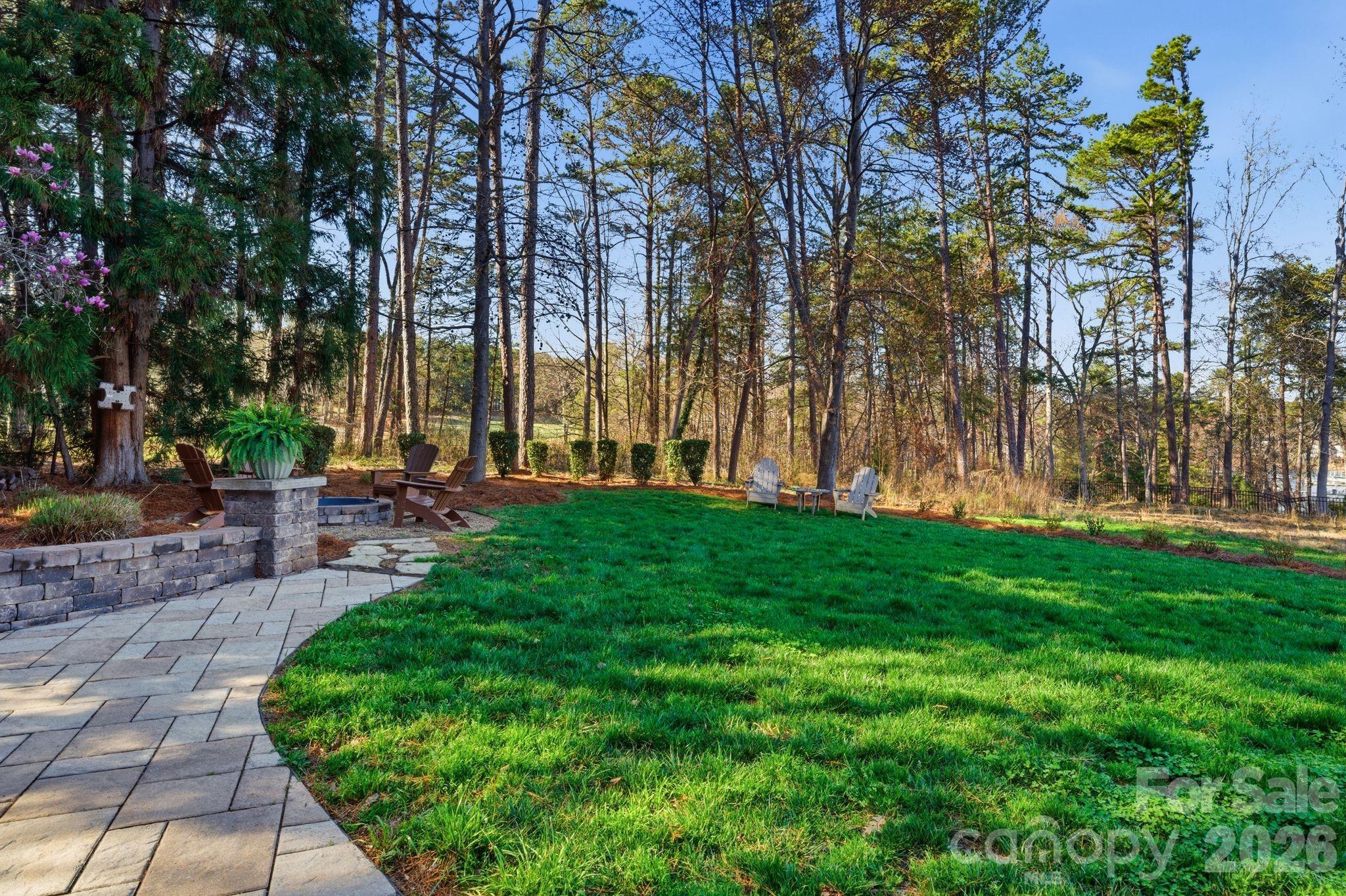 185 Quaker Road Mooresville, NC 28117 - Photo 41 of 43 a view of backyard with swimming pool and green space