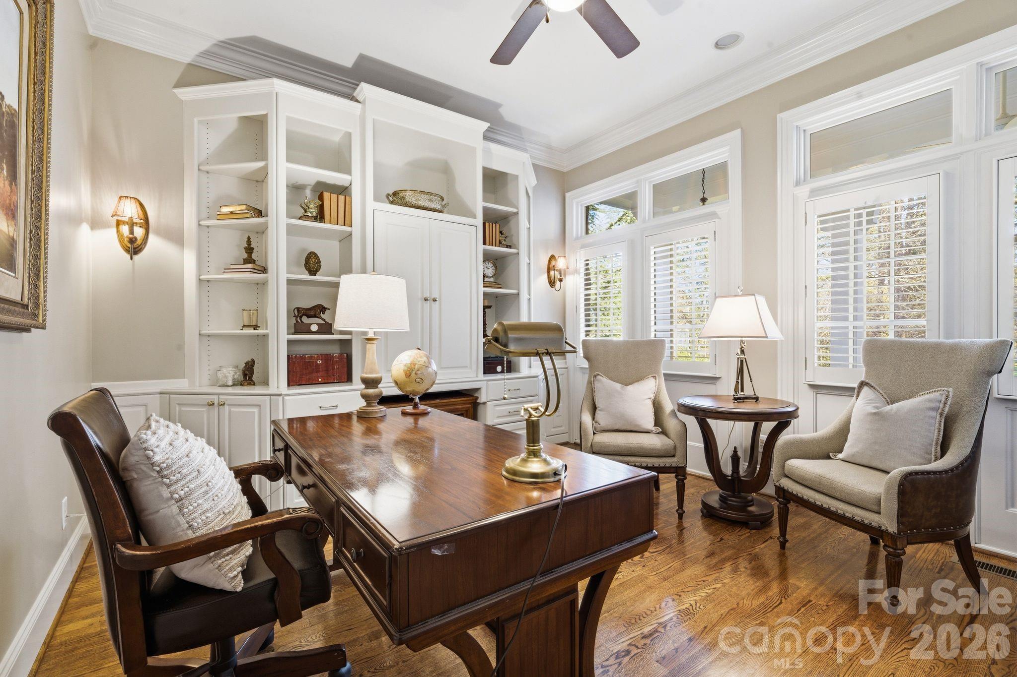 185 Quaker Road Mooresville, NC 28117 - Photo 7 of 43 a view of a dining room with furniture and wooden floor