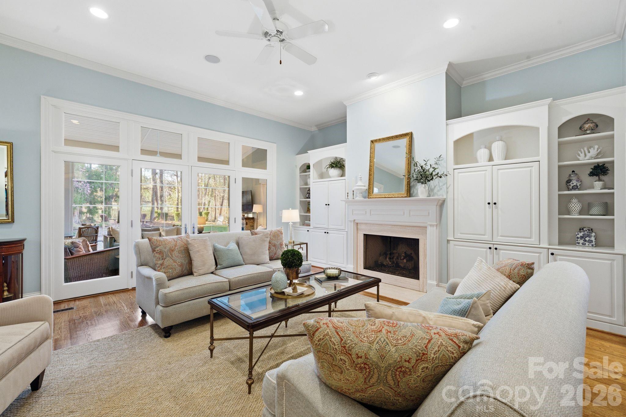 185 Quaker Road Mooresville, NC 28117 - Photo 10 of 43 a living room with furniture and a fireplace