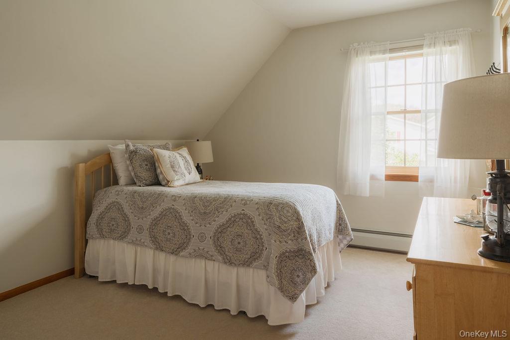 4 Echo Valley Road Red Hook, NY 12571 - Photo 22 of 33 a bedroom with a bed and a window