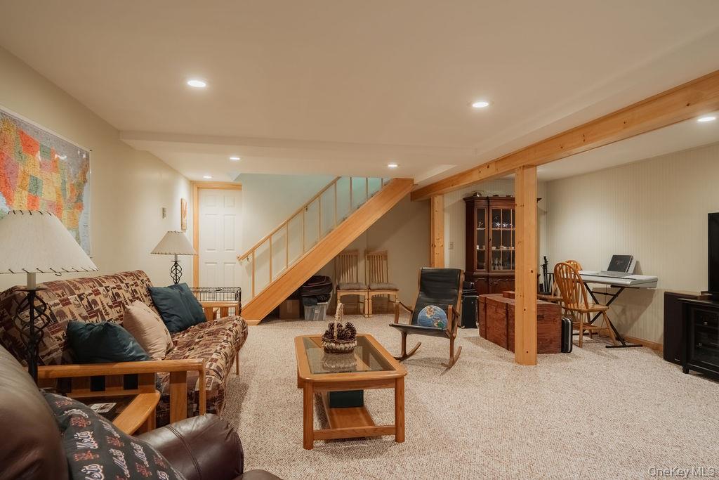 4 Echo Valley Road Red Hook, NY 12571 - Photo 24 of 33 a living room with furniture and stairs