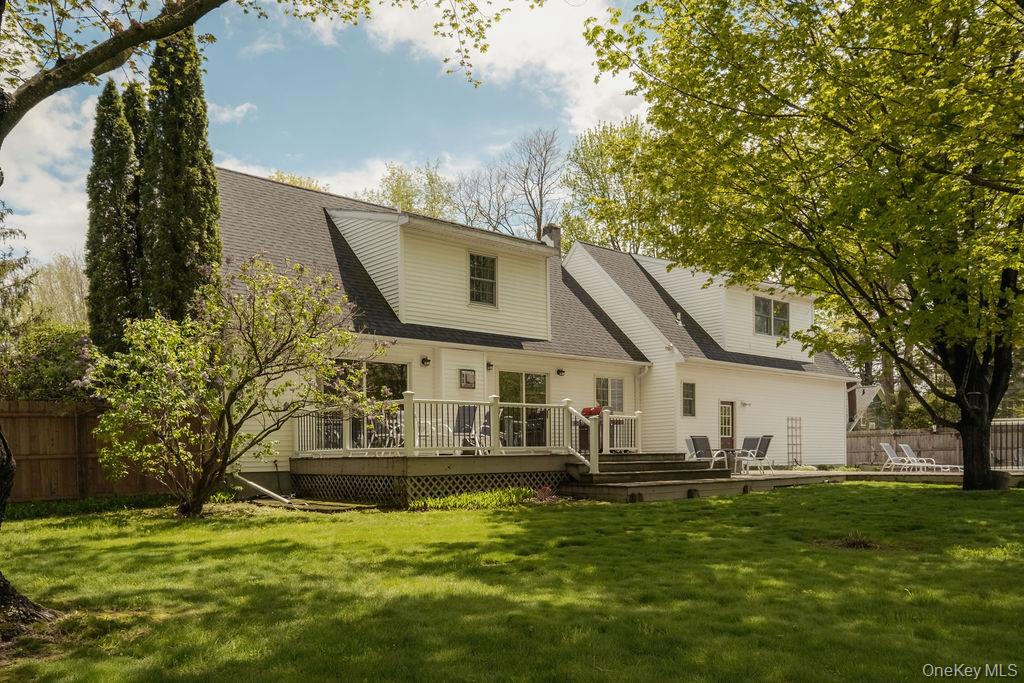 4 Echo Valley Road Red Hook, NY 12571 - Photo 25 of 33 a front view of a house with a garden