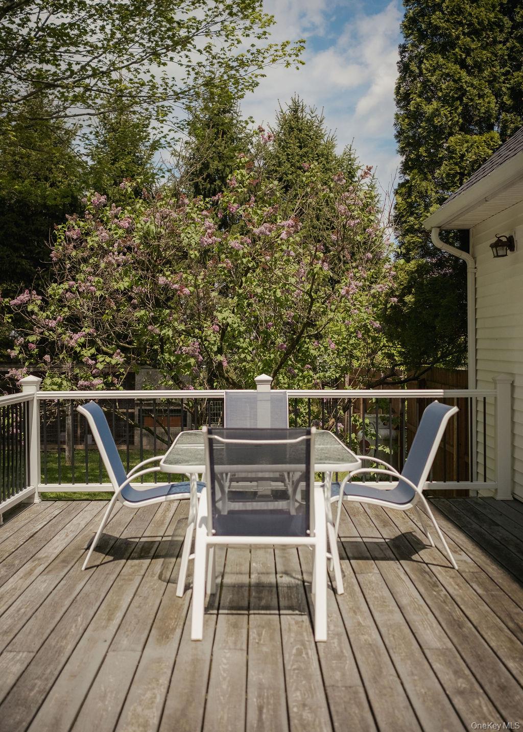 4 Echo Valley Road Red Hook, NY 12571 - Photo 27 of 33 a view of a roof deck with wooden floor and barbeque oven