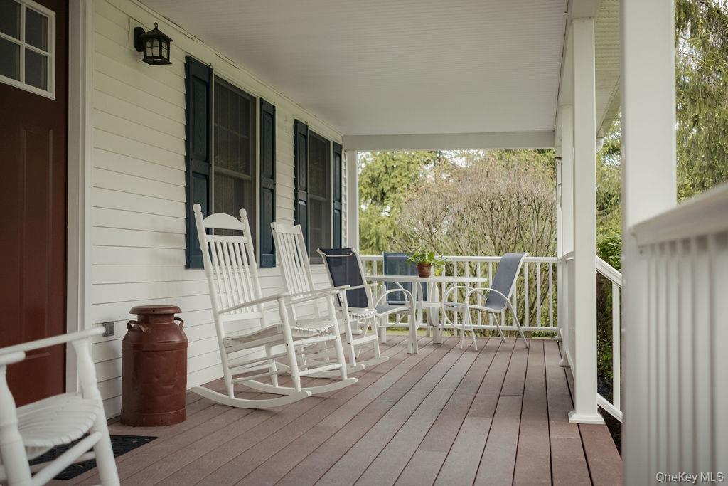 4 Echo Valley Road Red Hook, NY 12571 - Photo 3 of 33 a view of a balcony with chairs
