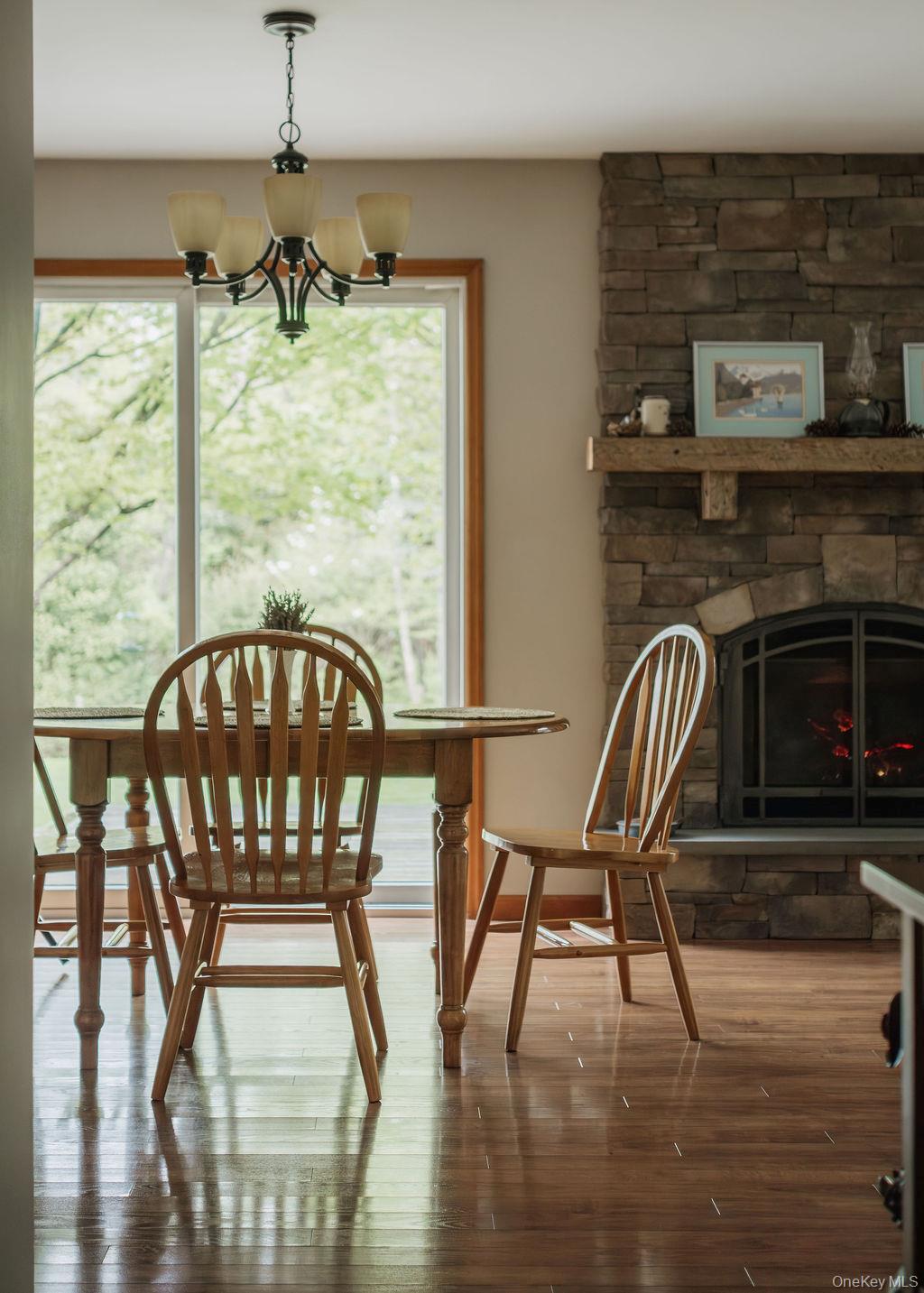 4 Echo Valley Road Red Hook, NY 12571 - Photo 4 of 33 a view of a dining room with furniture window and wooden floor