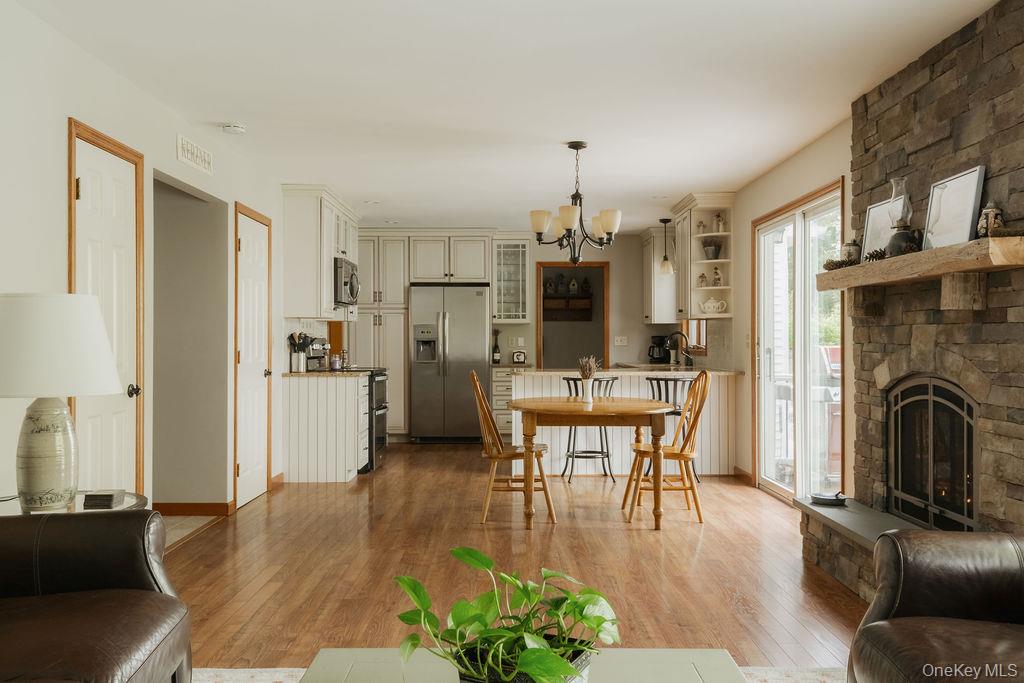 4 Echo Valley Road Red Hook, NY 12571 - Photo 6 of 33 a view of a kitchen with furniture and a fireplace