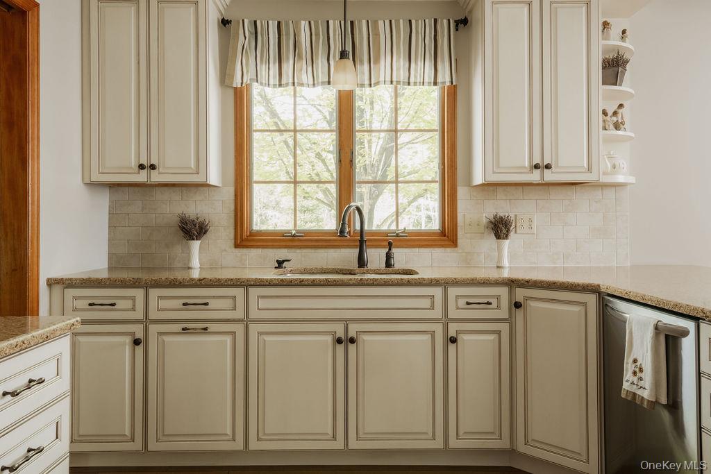 4 Echo Valley Road Red Hook, NY 12571 - Photo 7 of 33 a kitchen with white cabinets and sink