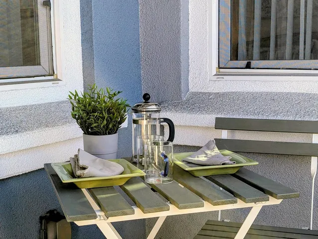 a view of a terrace with seating area