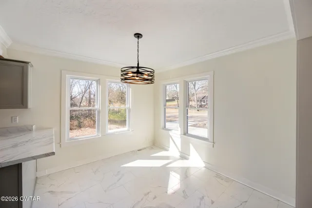 a view of a livingroom with a chandelier
