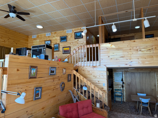 358 South Sky Drive Torrey, UT 84775 - Photo 34 of 82 Interior featuring extensive wood paneling and a multi-level design