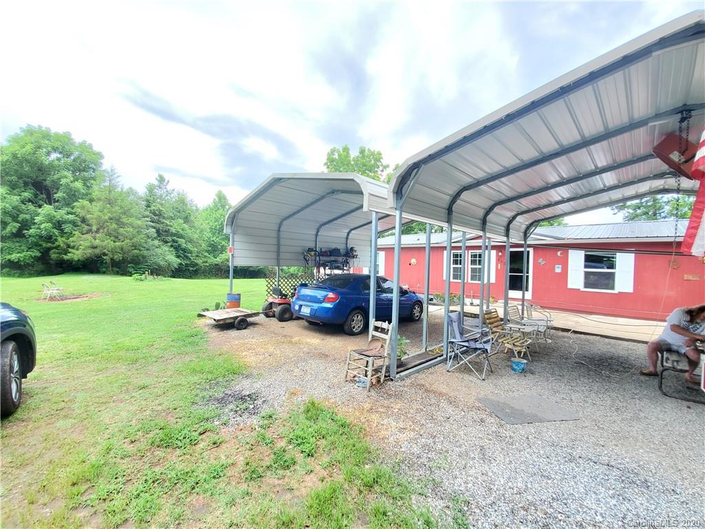 483 Freeman Road Forest City, NC 28043 - Photo 16 of 21 a view of outdoor space yard deck patio and fire pit