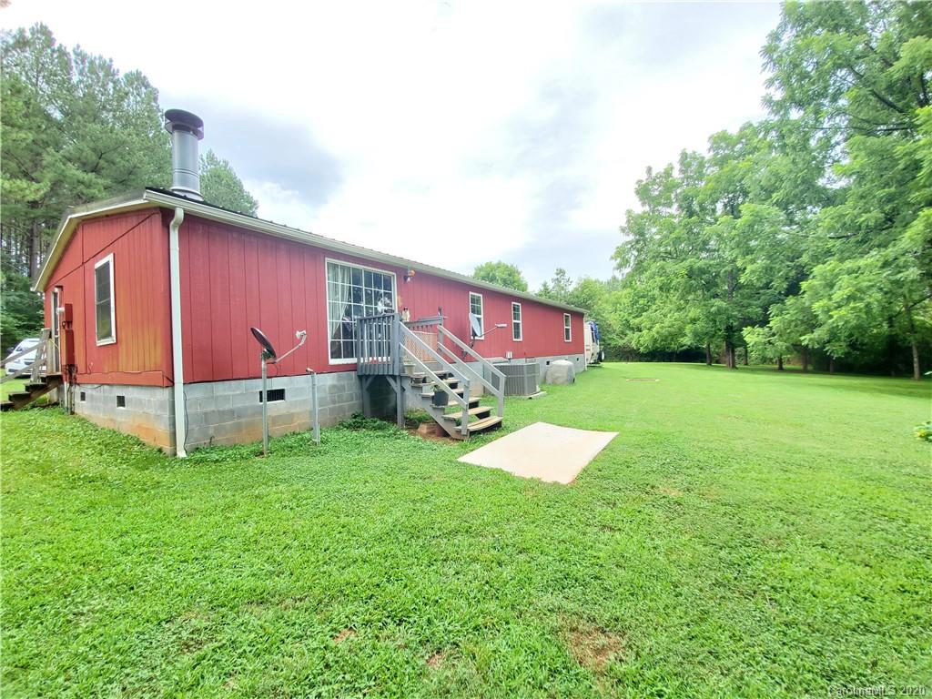 483 Freeman Road Forest City, NC 28043 - Photo 19 of 21 a front view of house with yard and trees