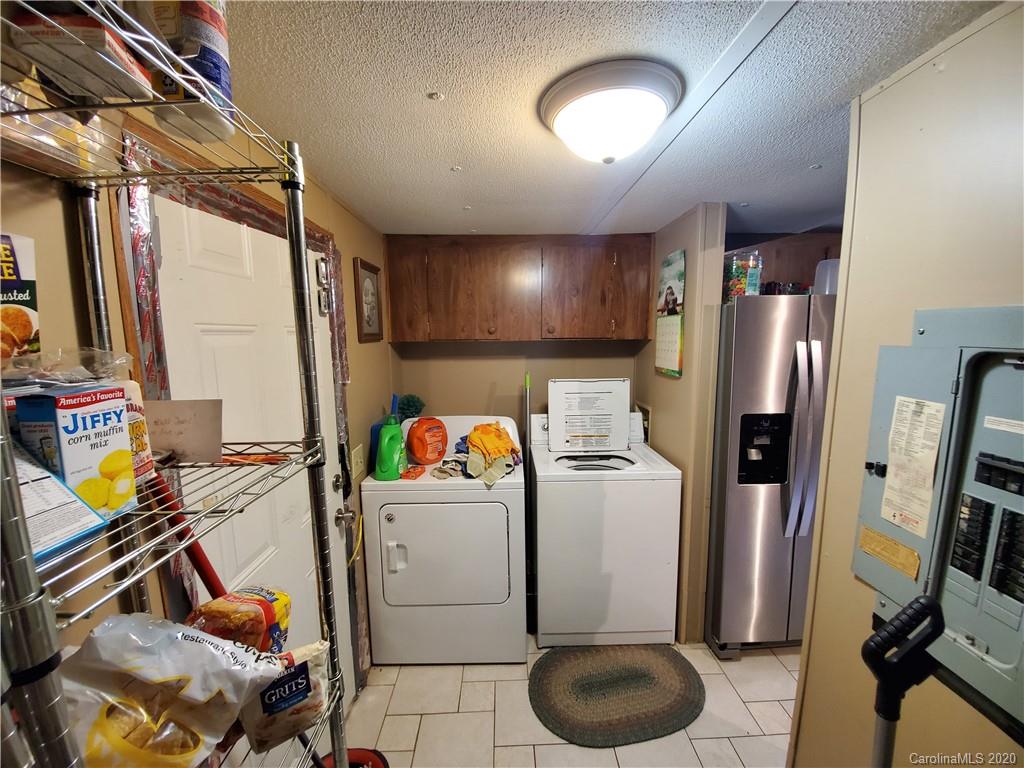 483 Freeman Road Forest City, NC 28043 - Photo 7 of 21 a room with furniture a washer and dryer