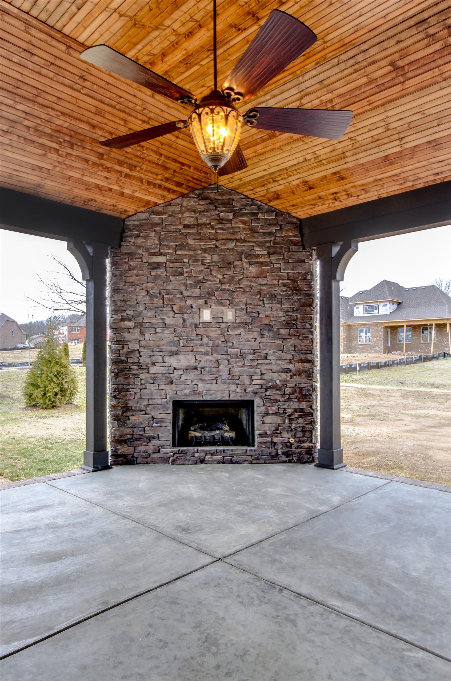 1361 Center Point Road Hendersonville, TN 37075 - Photo 22 of 22 a view of an empty room with a fireplace and a window