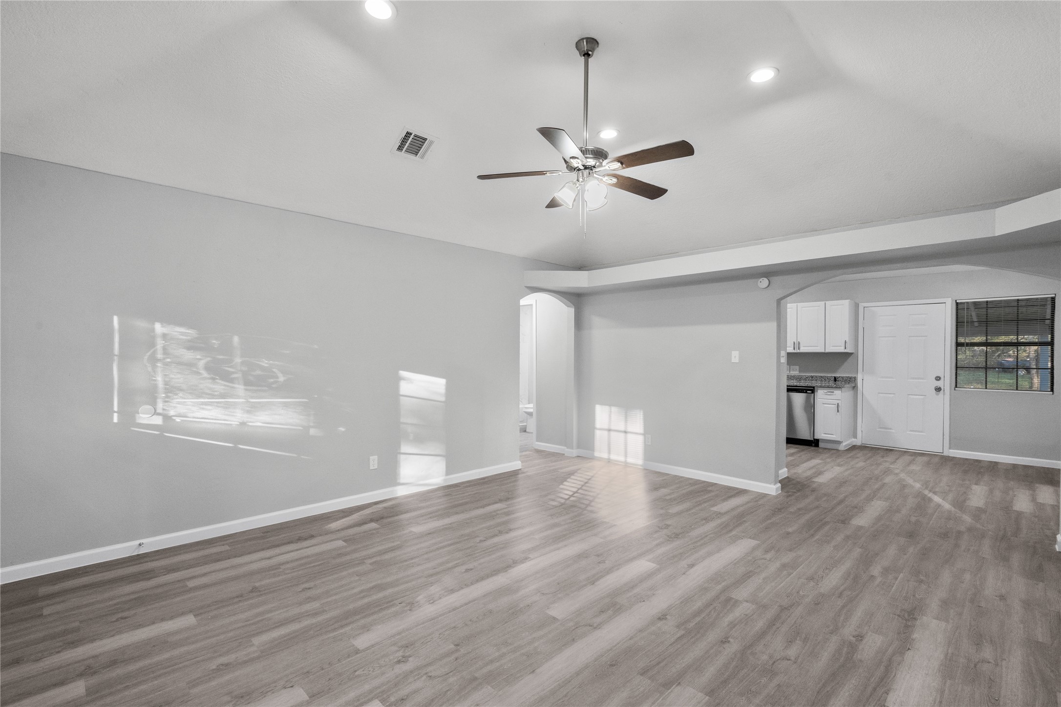 20575 Kings Road New Caney, TX 77357 - Photo 4 of 19 A view of the spacious living room looking toward the kitchen.