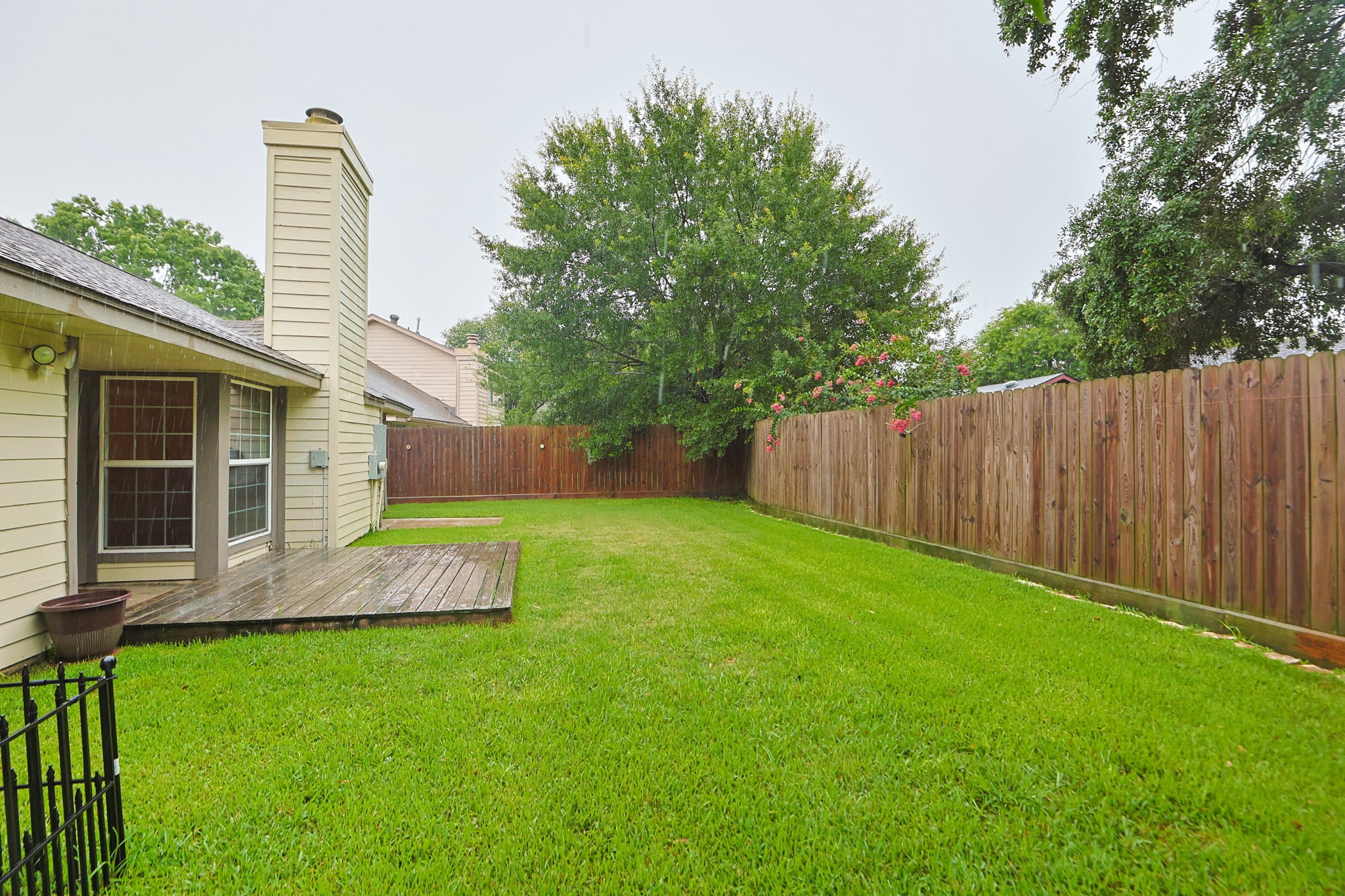 11947 Paddock Way Houston, TX 77065 - Photo 15 of 16 Lush backyard with new fencing.