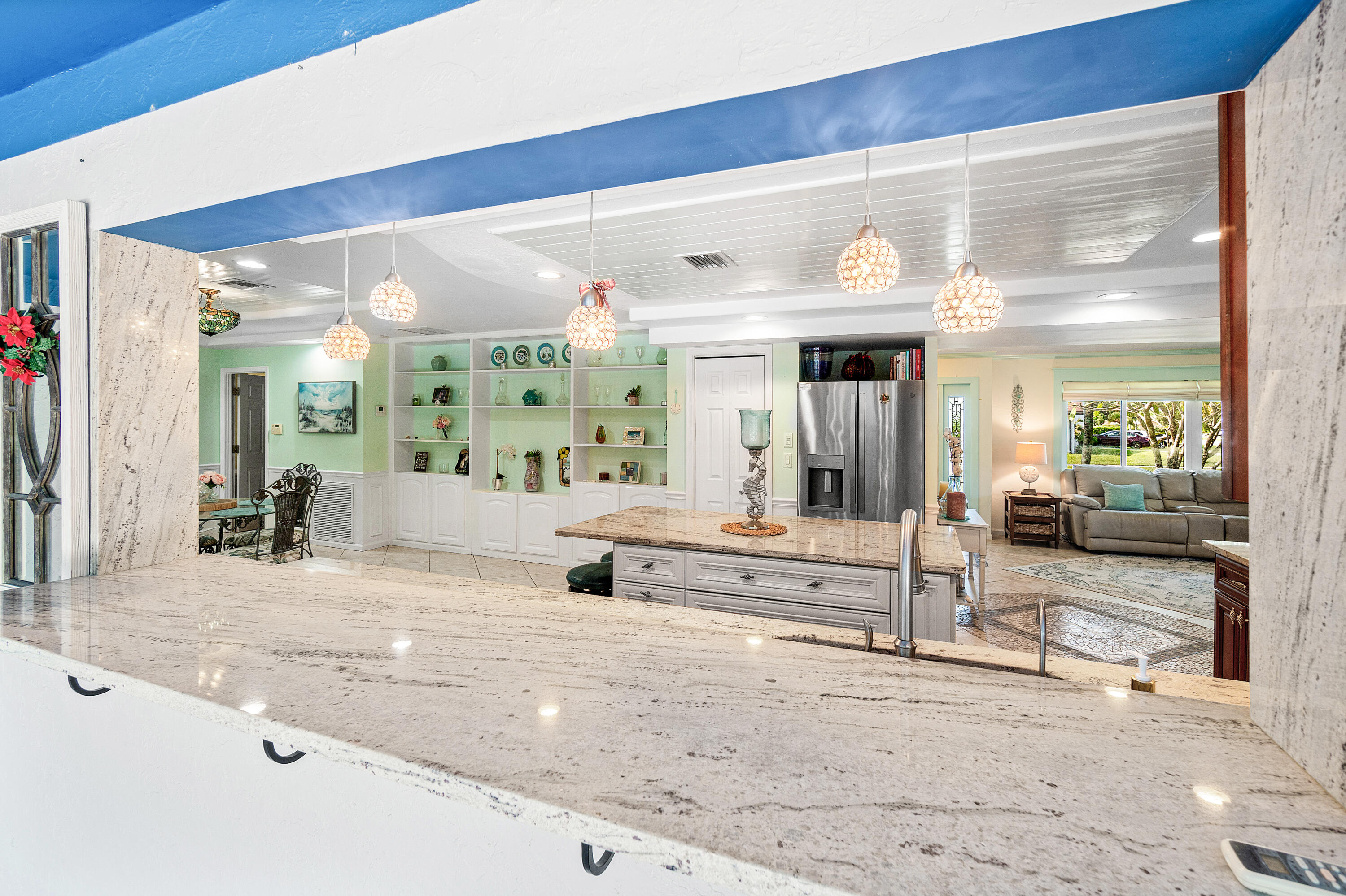 1108 Petrel Road Wellington, FL 33414 - Photo 16 of 46 a view of a living room and entry way