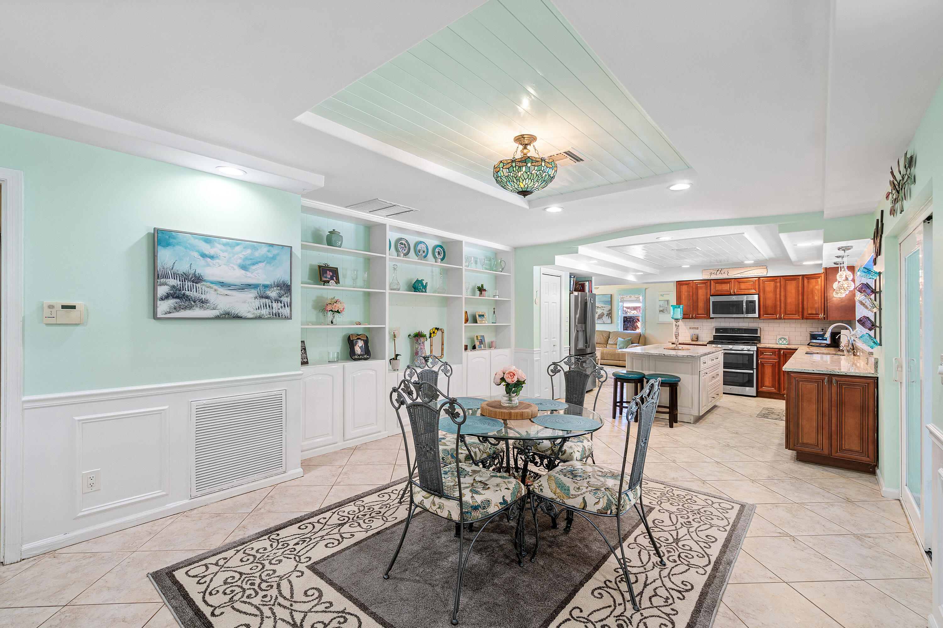 1108 Petrel Road Wellington, FL 33414 - Photo 17 of 46 a view of a dining room with furniture