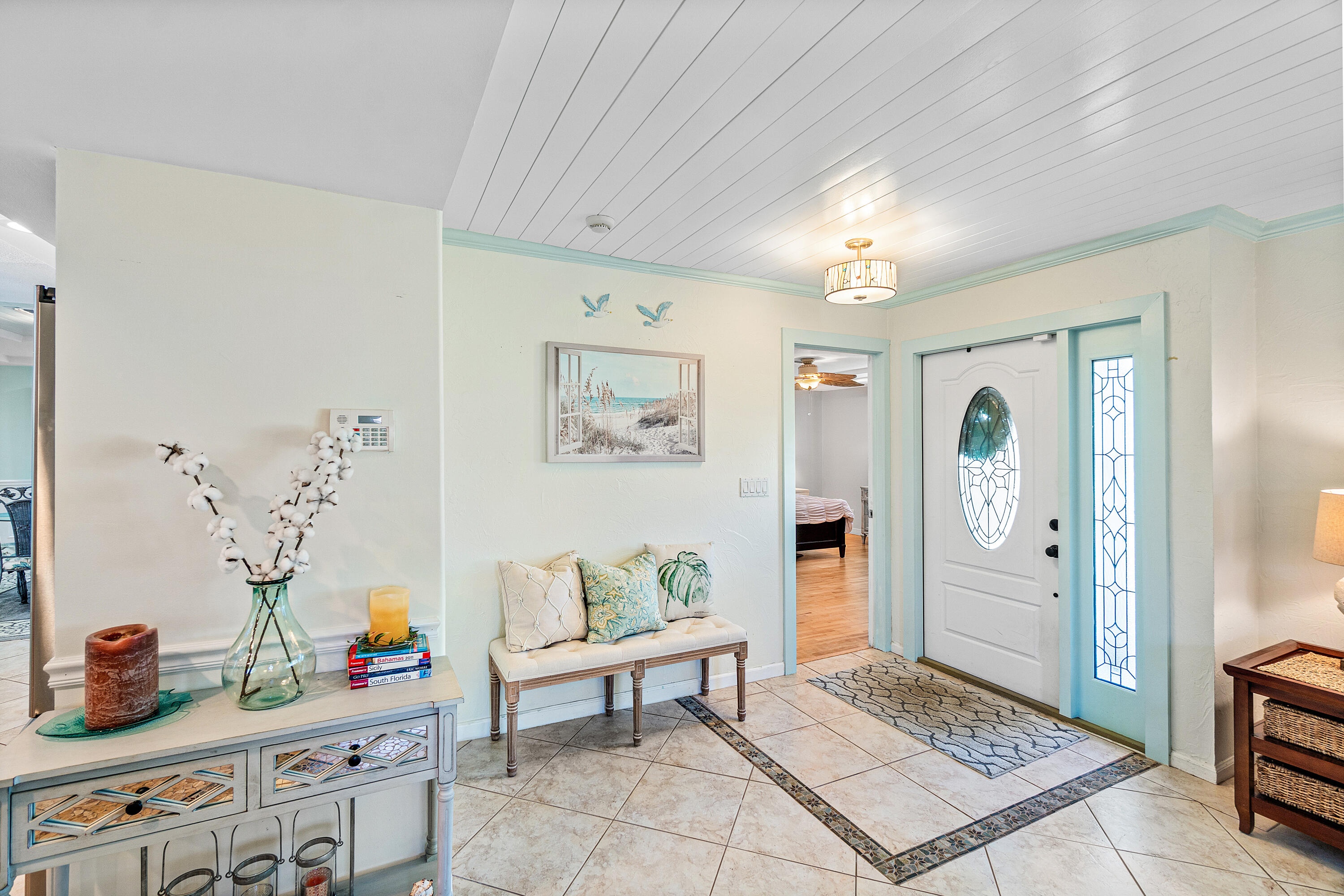 1108 Petrel Road Wellington, FL 33414 - Photo 5 of 46 a living room with furniture and wooden floor