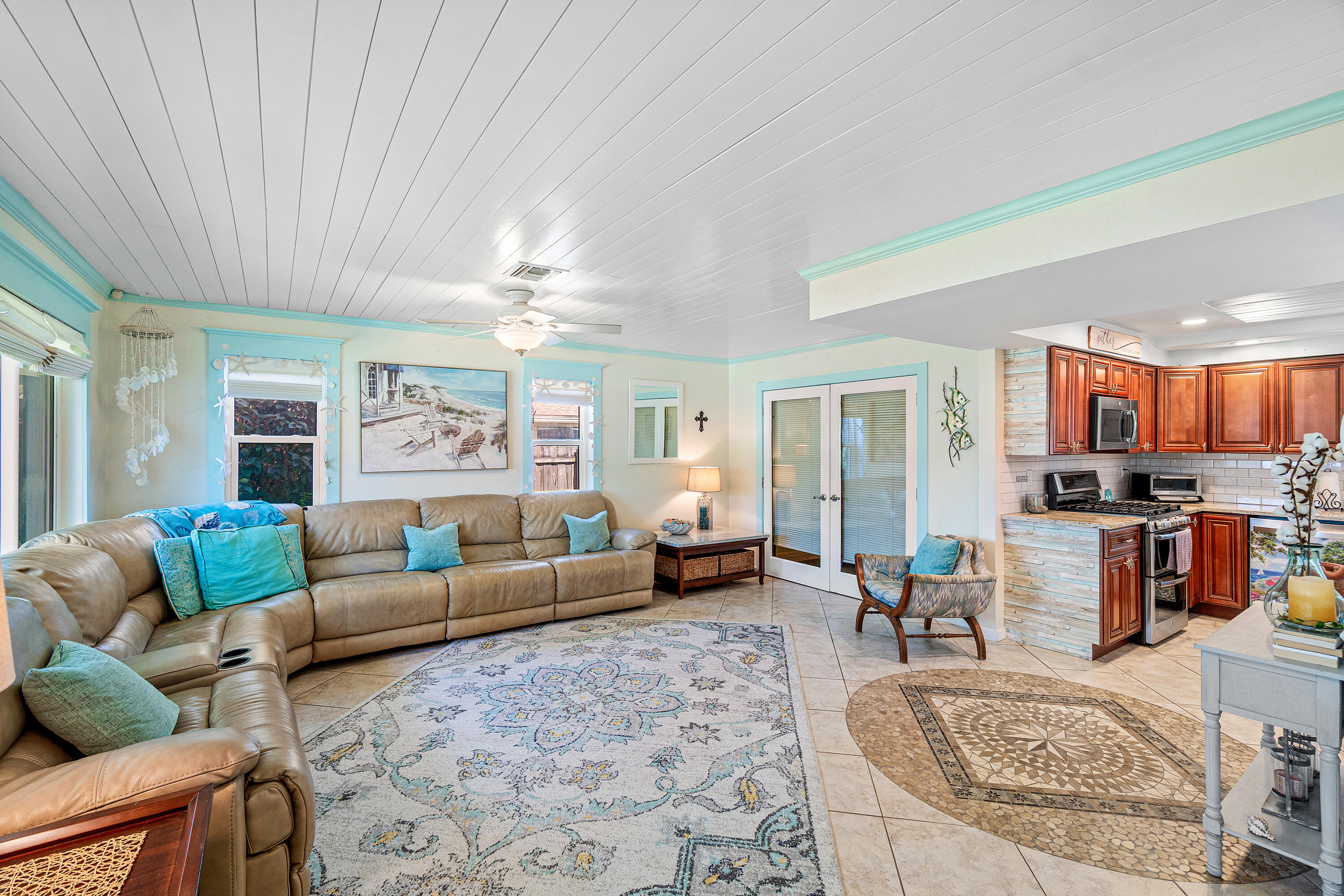 1108 Petrel Road Wellington, FL 33414 - Photo 8 of 46 a living room with furniture and a large window