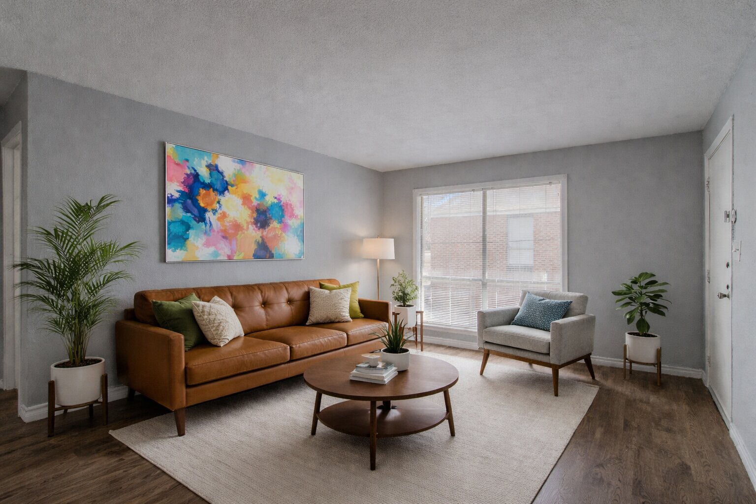 100 Uhland Road, Unit 3 San Marcos, TX 78666 - Photo 1 of 24 Living room with dark wood-type flooring and baseboards