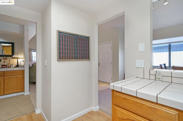 a bedroom with a bed and a view of bathroom