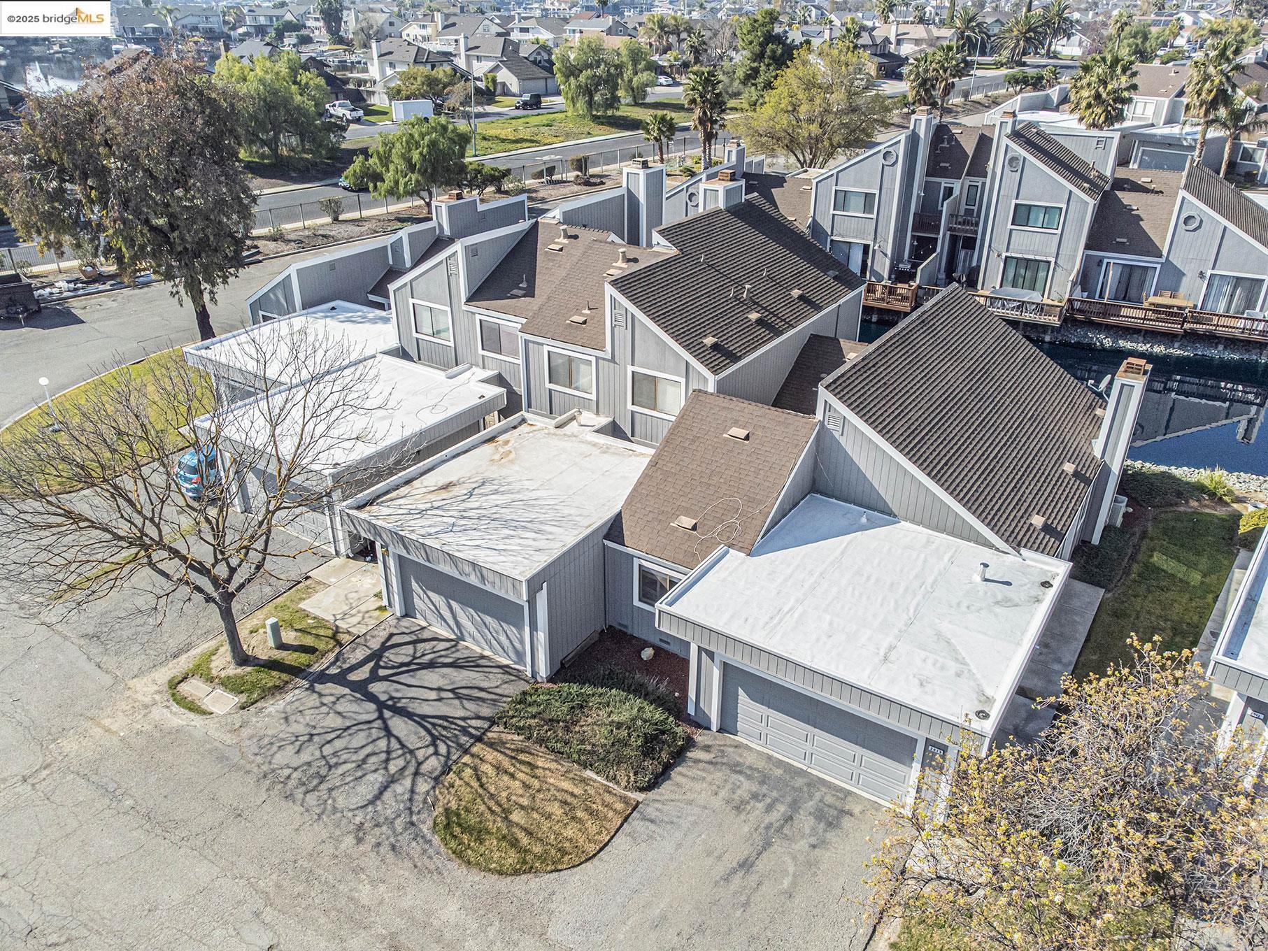2013 Sand Point Road Discovery Bay, CA 94505 - Photo 17 of 28 an aerial view of a house with swimming pool and ocean view