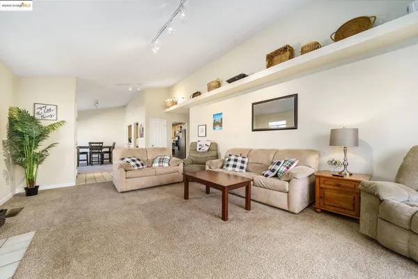 a living room with furniture and a couch