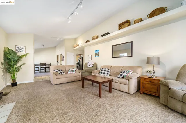 a living room with furniture and a couch