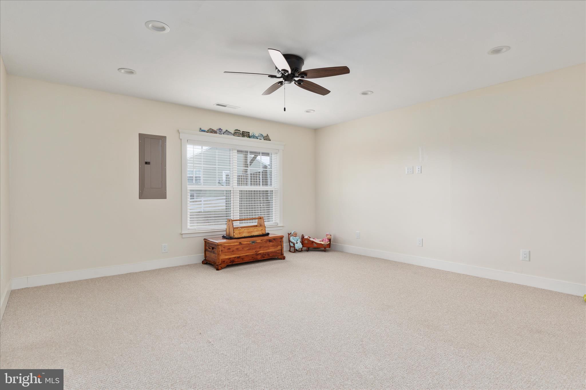 110 Halo Court Stephenson, VA 22656 - Photo 25 of 64 an empty room with chandelier fan and windows