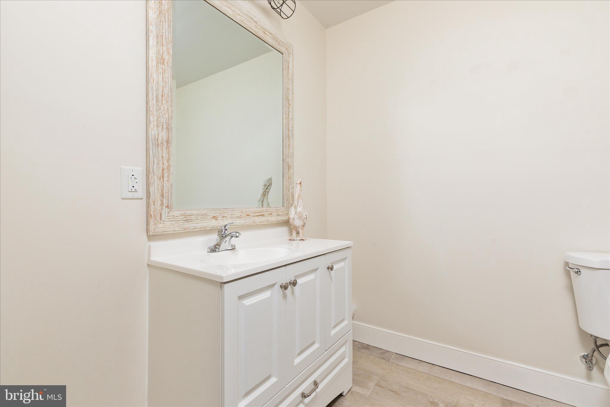 110 Halo Court Stephenson, VA 22656 - Photo 26 of 64 a bathroom with a sink and a mirror