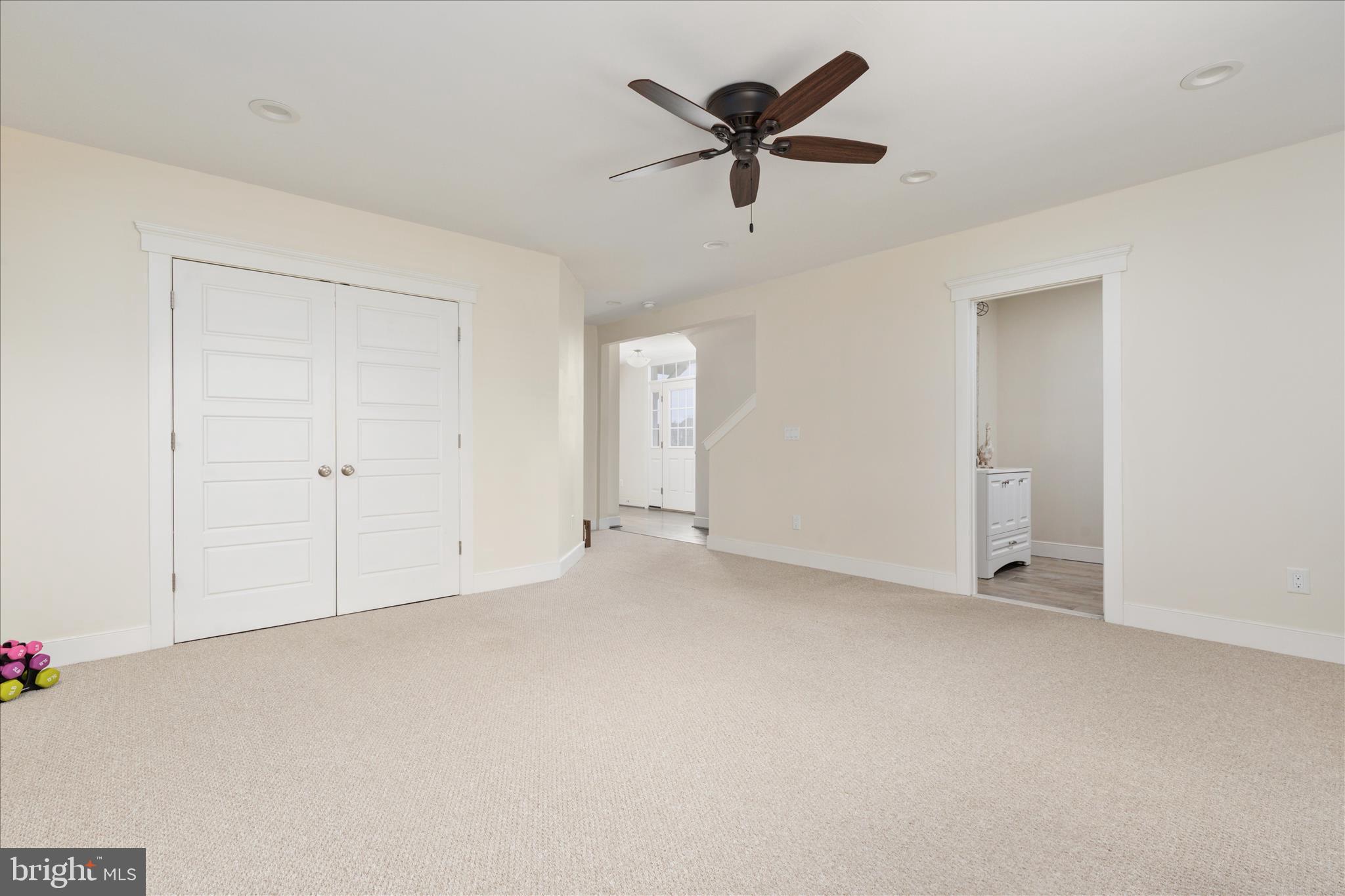110 Halo Court Stephenson, VA 22656 - Photo 30 of 64 an empty room with ceiling fan and windows